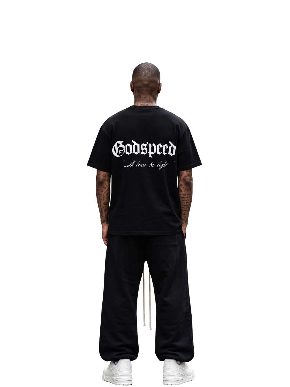 Godspeed black oversized graphic t shirt at unseen grail. local brands south africa. streetwear. men and women. studio image behind male model full outfit. galxboy, bantu, boys of soweto