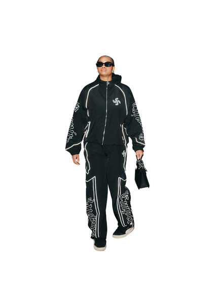 empire black oversized graphic tracksuit at unseen grail. local brands south africa. streetwear. men and women. studio image female model front