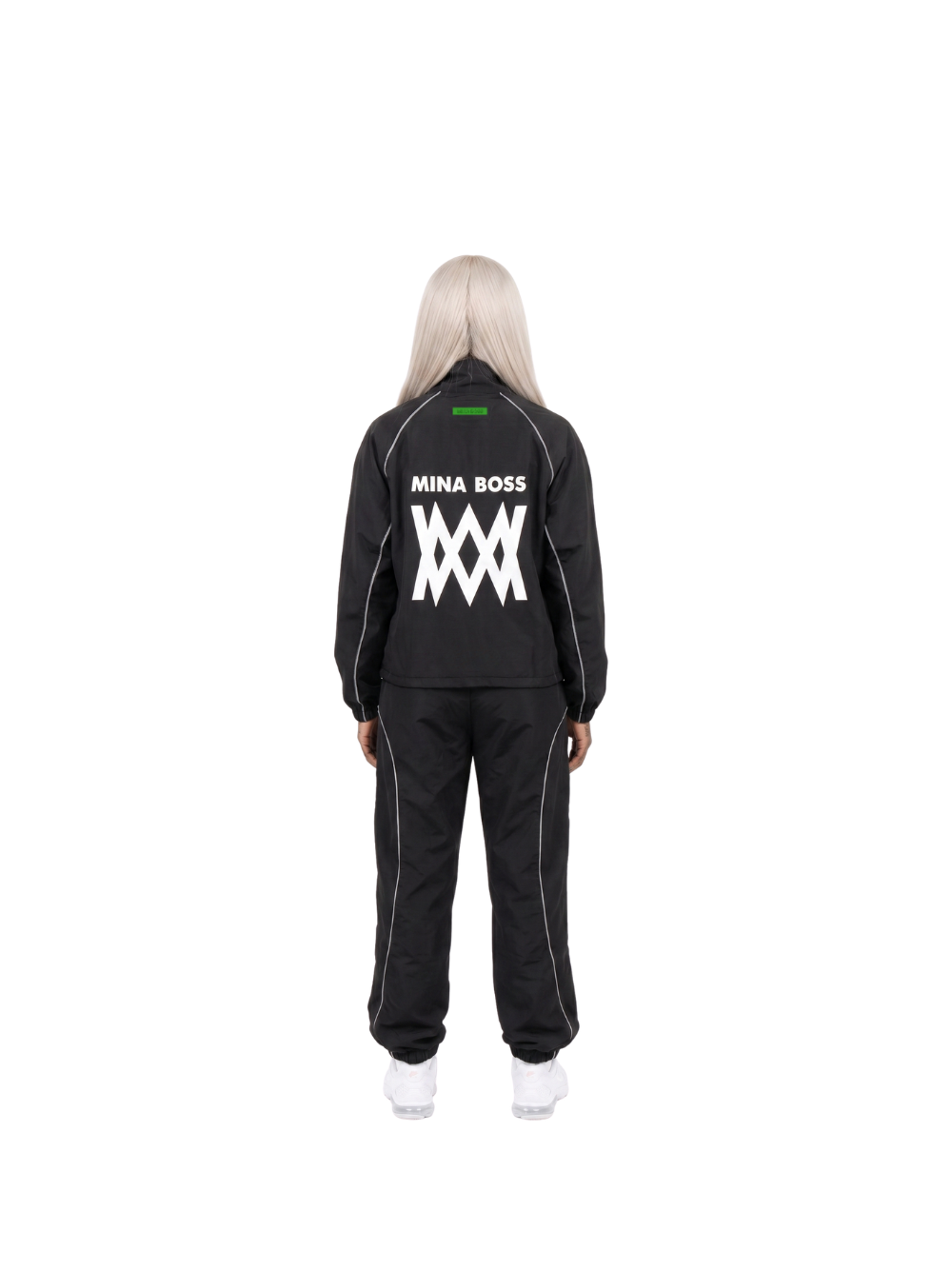 Mina Boss black oversized graphic tracksuit at unseen grail. local brands south africa. streetwear. men and women. studio image front. el patron back image female