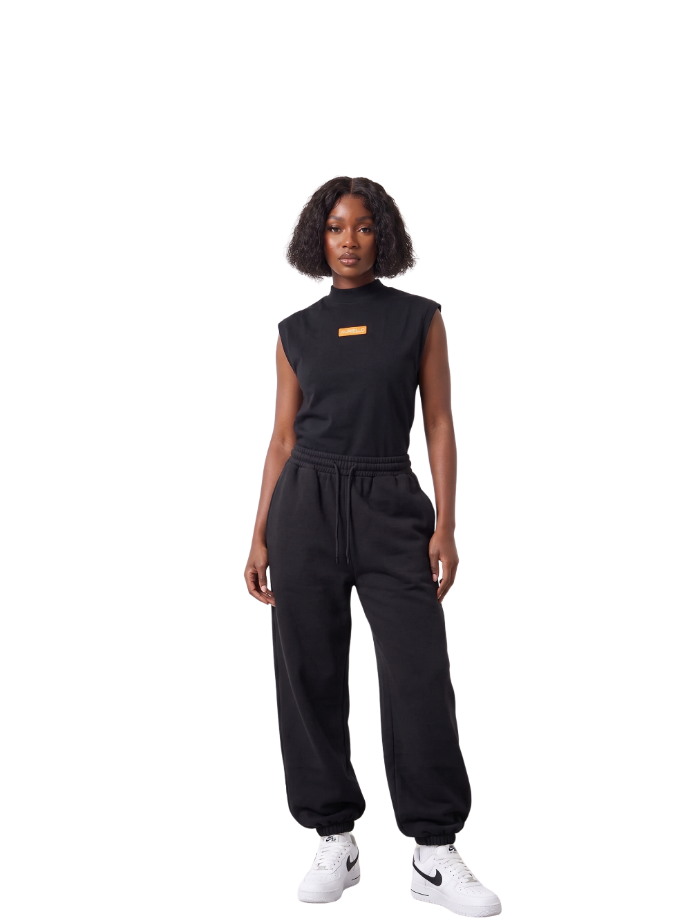 Auriello black oversized graphic vest at unseen grail. local brands south africa. streetwear. men and women. studio image front female studio model