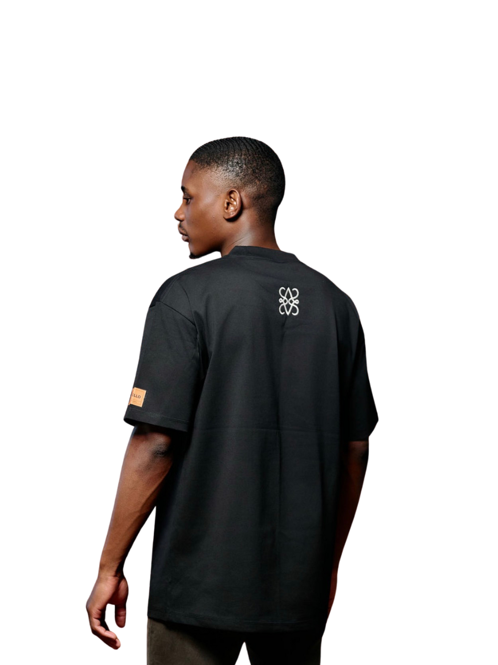 Auriello black oversized graphic vest at unseen grail. local brands south africa. streetwear. men and women. studio image male model back