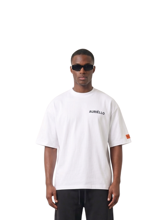 Auriello white oversized graphic vest at unseen grail. local brands south africa. streetwear. men and women. studio image male model front sunglasses