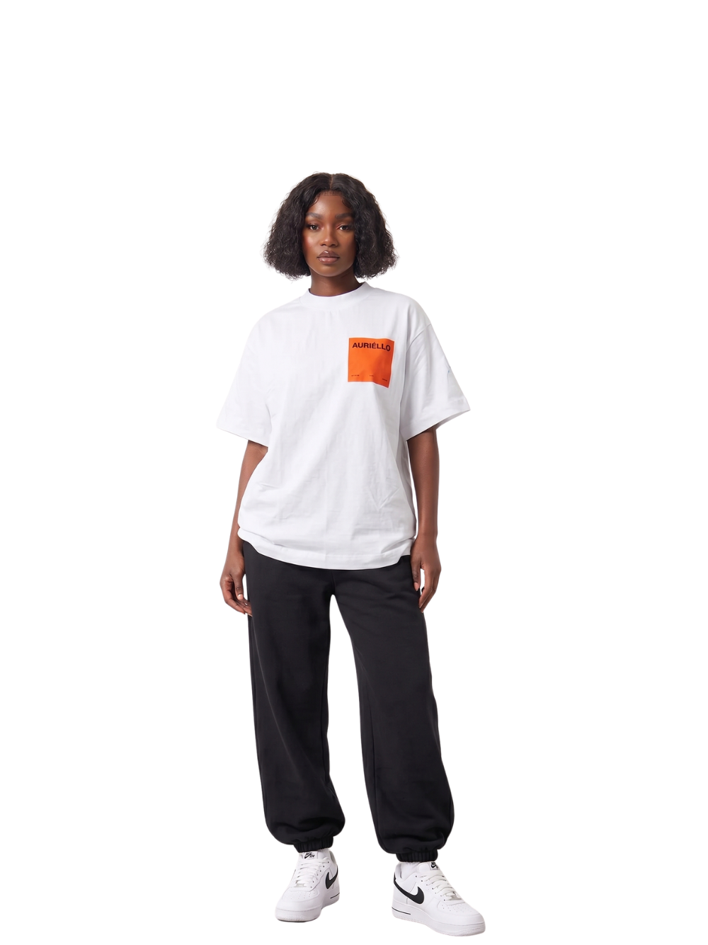 Auriello white oversized graphic vest at unseen grail. local brands south africa. streetwear. men and women. studio image orange pocket female model 