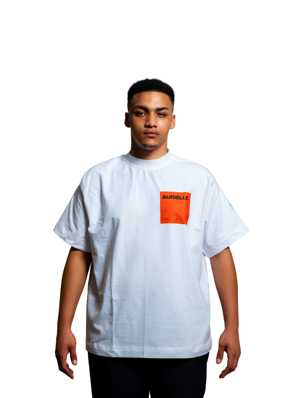 Auriello white oversized graphic vest at unseen grail. local brands south africa. streetwear. men and women. studio image orange pocket male model standing