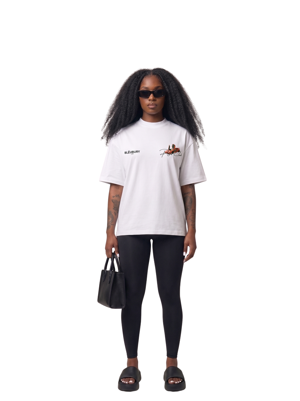 Bleu Bury white oversized graphic t shirt at unseen grail. local brands south africa. streetwear. men and women. galxboy. bantu. nike. studio image female model