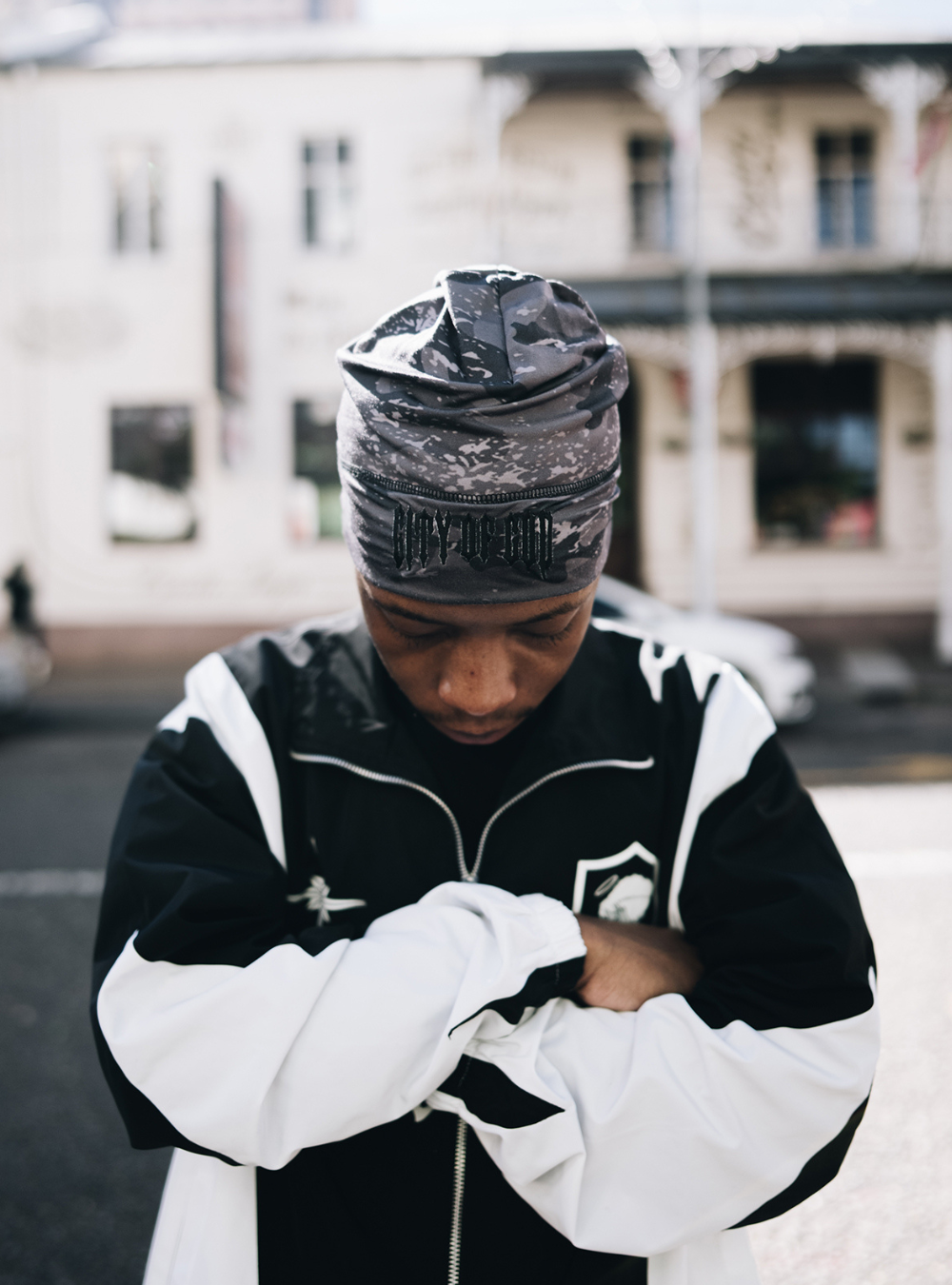 City of Gods black skull caps. local brands from south africa found at Unseen Grail. men and women. close up front male model