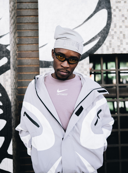 City of Gods grey skull caps. local brands from south africa found at Unseen Grail. men and women. close up front male model