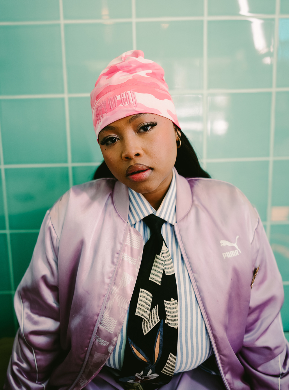 City of Gods pink camo skull caps. local brands from south africa found at Unseen Grail. men and women. female model front 1