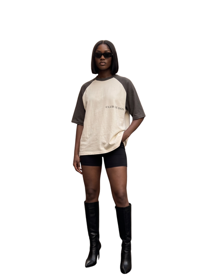 Club Le Don cream oversized graphic t shirt at unseen grail. local brands south africa. streetwear. men and women. studio image female model front full outfit