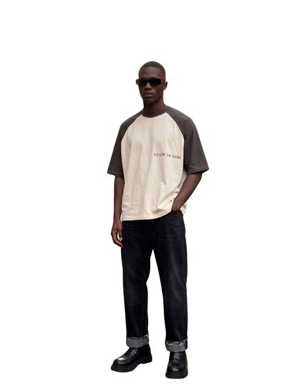 Club Le Don cream oversized graphic t shirt at unseen grail. local brands south africa. streetwear. men and women. studio image male model front full outfit