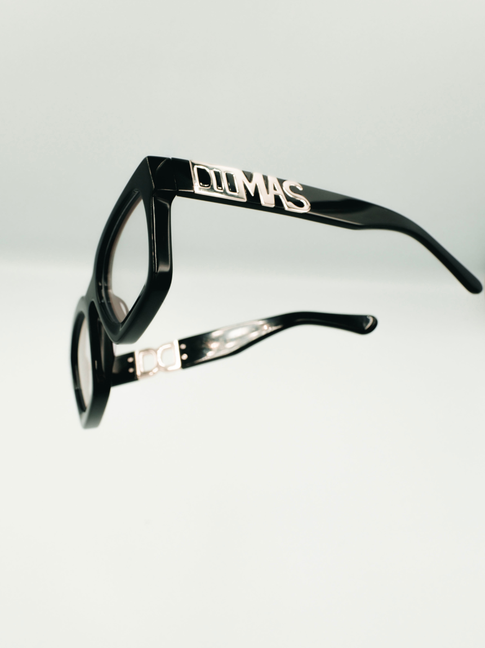 Dimas black Eyewear unisex sunglasses collection modern fashion frames South African eyewear brand 3 studio images