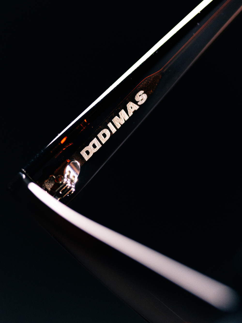 Dimas black frame black lense Eyewear unisex sunglasses collection modern fashion frames South African eyewear brand 1 studio image close up