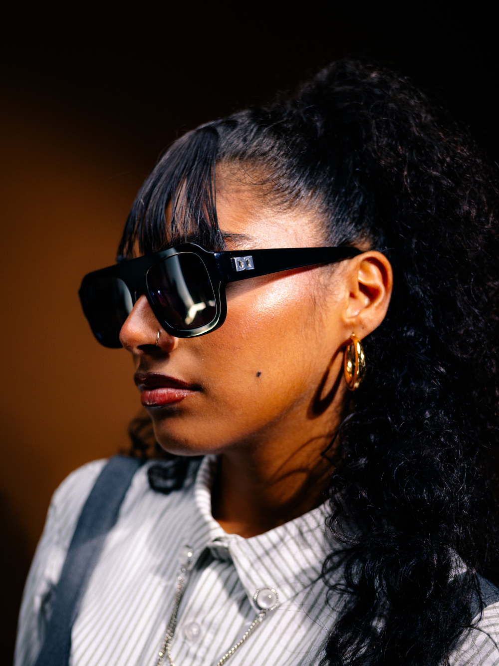 Dimas black frame black lense Eyewear unisex sunglasses collection modern fashion frames South African eyewear brand 1 studio image female model