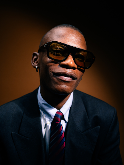 Dimas brown frame yellow lenses Eyewear unisex sunglasses collection modern fashion frames South African eyewear brand. studio image 1 male model 1
