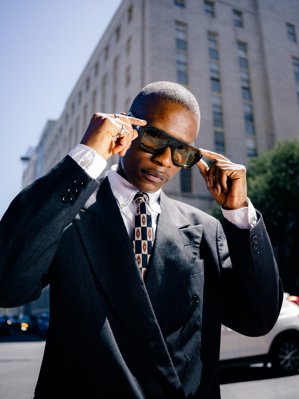 Dimas brown frame yellow lenses Eyewear unisex sunglasses collection modern fashion frames South African eyewear brand. studio image 1 male model 2