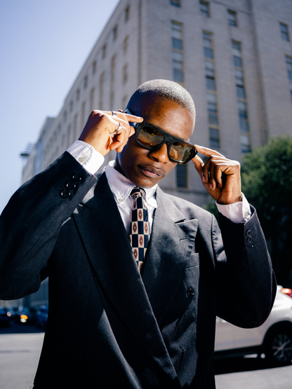 Dimas brown frame yellow lenses Eyewear unisex sunglasses collection modern fashion frames South African eyewear brand. studio image 1 male model 2