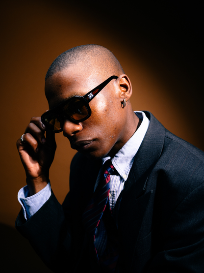 Dimas brown frame yellow lenses Eyewear unisex sunglasses collection modern fashion frames South African eyewear brand. studio image 1 male model 3