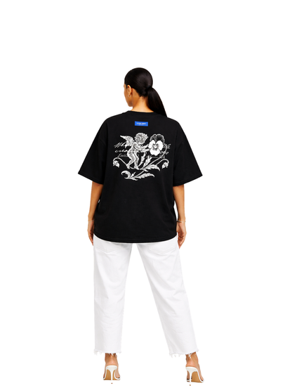 Elizabeth Dust black oversized graphic t shirt at unseen grail. local brands south africa. streetwear. men and women. studio image female model behind full outfit