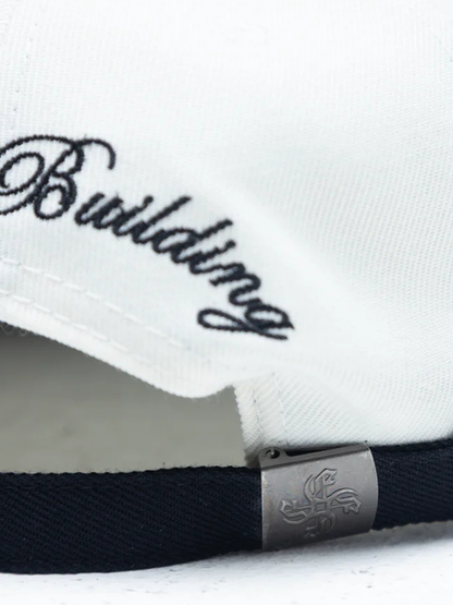 Empire adjustable cap  at unseen grail. local brands south africa. streetwear. men and women. studio image cream cap back close up