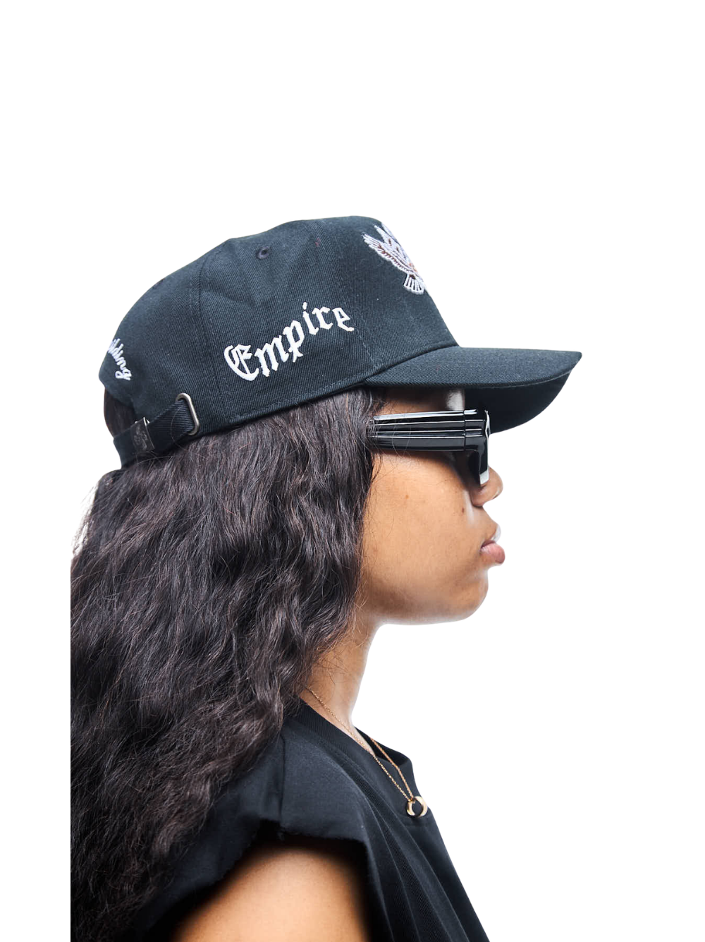 Empire adjustable cap  at unseen grail. local brands south africa. streetwear. men and women. studio image female model side