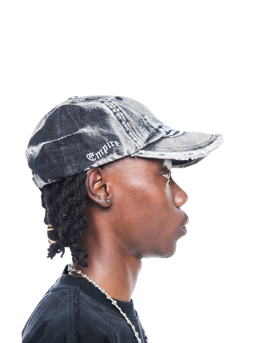 Empire adjustable cap black at unseen grail. local brands south africa. streetwear. men and women. studio image male model side view