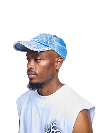 Empire adjustable cap blue at unseen grail. local brands south africa. streetwear. men and women. studio image male model side