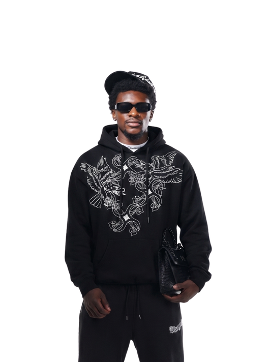 Empire black oversized graphic hoodie at unseen grail. local brands south africa. streetwear. men and women. studio image male model front