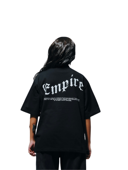 Empire black oversized graphic t shirt at unseen grail. local brands south africa. streetwear. men and women. studio image female model back view