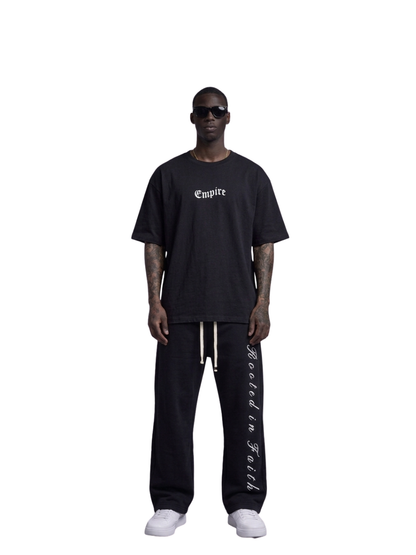 Empire black oversized graphic t shirt at unseen grail. local brands south africa. streetwear. men and women. studio image male model full front view