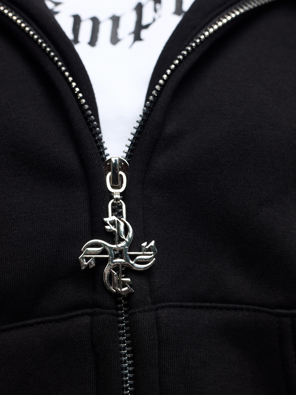 Empire black oversized zipper hoodie at unseen grail. local brands south africa. streetwear. men and women. studio image close up