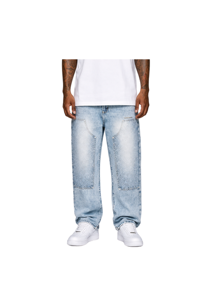 Empire blue denim jeanes at unseen grail. local brands south africa. streetwear. men and women. studio image close up men