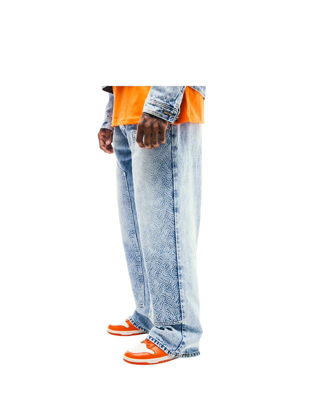Empire blue denim jeanes at unseen grail. local brands south africa. streetwear. men and women. studio image close up men side view