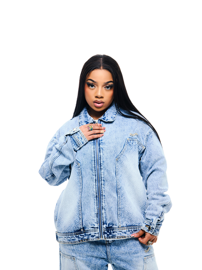 Empire blue denim jeanes at unseen grail. local brands south africa. streetwear. men and women. studio image female model front