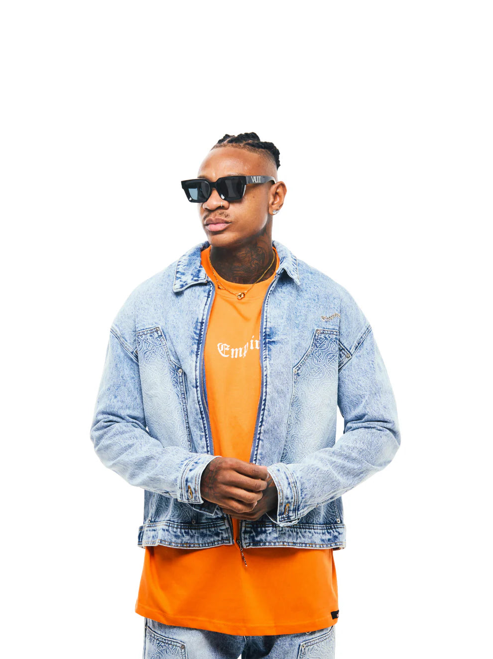 Empire blue denim jeanes at unseen grail. local brands south africa. streetwear. men and women. studio image male model front