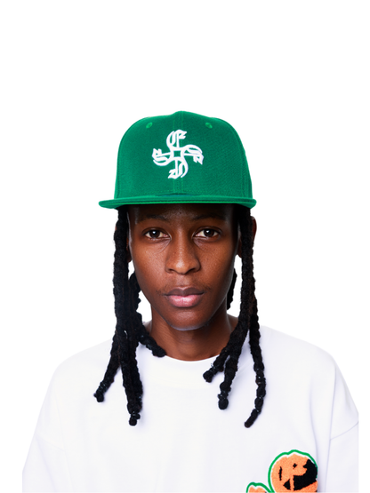 Empire green fitted cap at unseen grail. local brands south africa. streetwear. men and women. studio image male model front