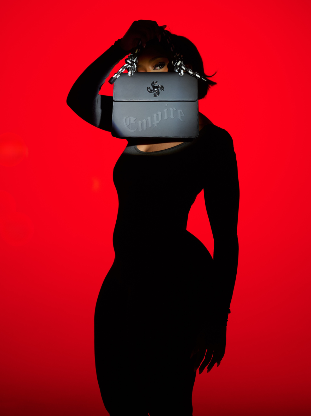 Empire handbag at unseen grail. local brands south africa. streetwear. men and women. female model studio 4