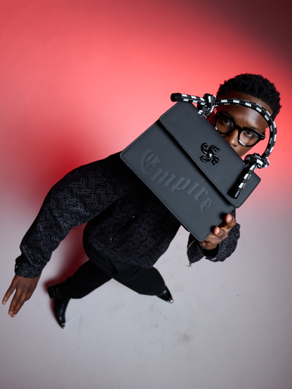 Empire handbag at unseen grail. local brands south africa. streetwear. men and women. male model 2