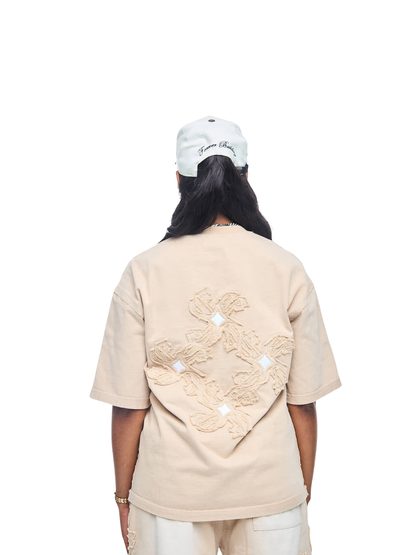 Empire heavyweight tshirt  cream at unseen grail. local brands south africa. streetwear. men and women. studio image female back shot