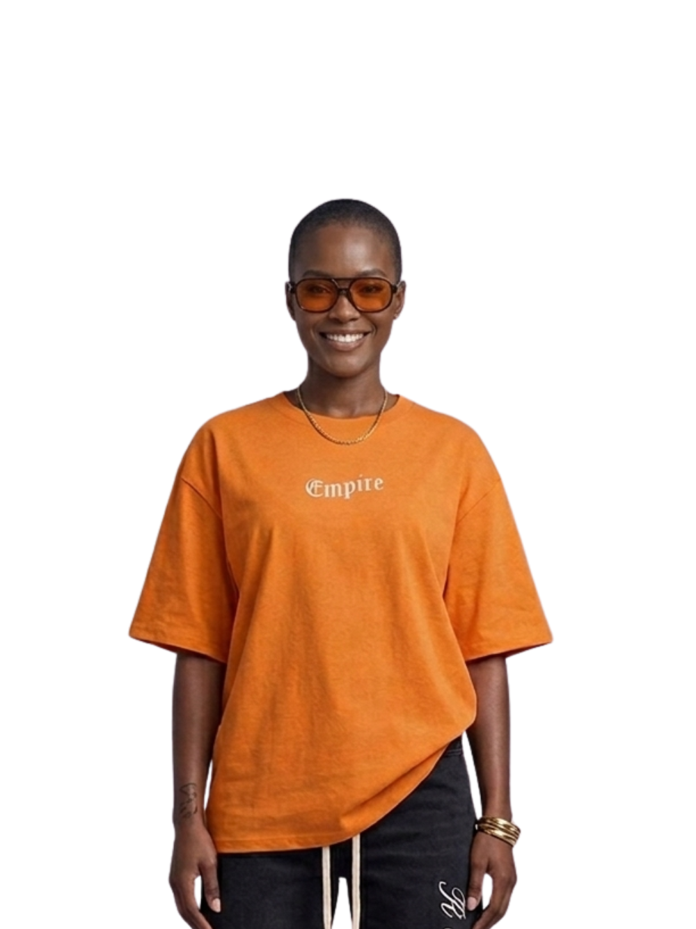 Empire orange oversized graphic t shirt at unseen grail. local brands south africa. streetwear. men and women. studio image female model front view