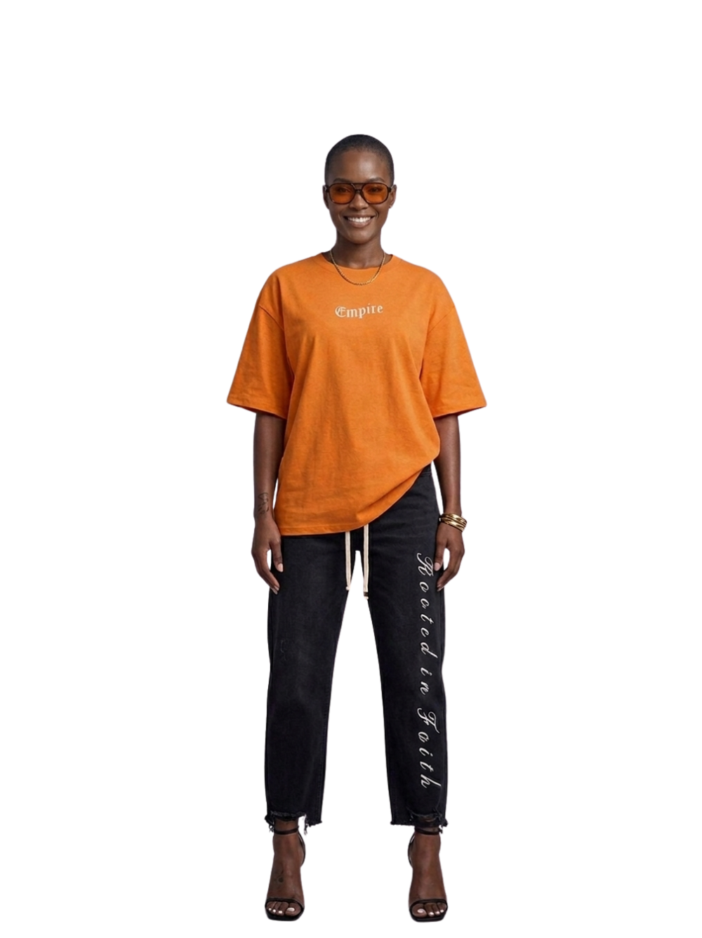 Empire orange oversized graphic t shirt at unseen grail. local brands south africa. streetwear. men and women. studio image female model full image