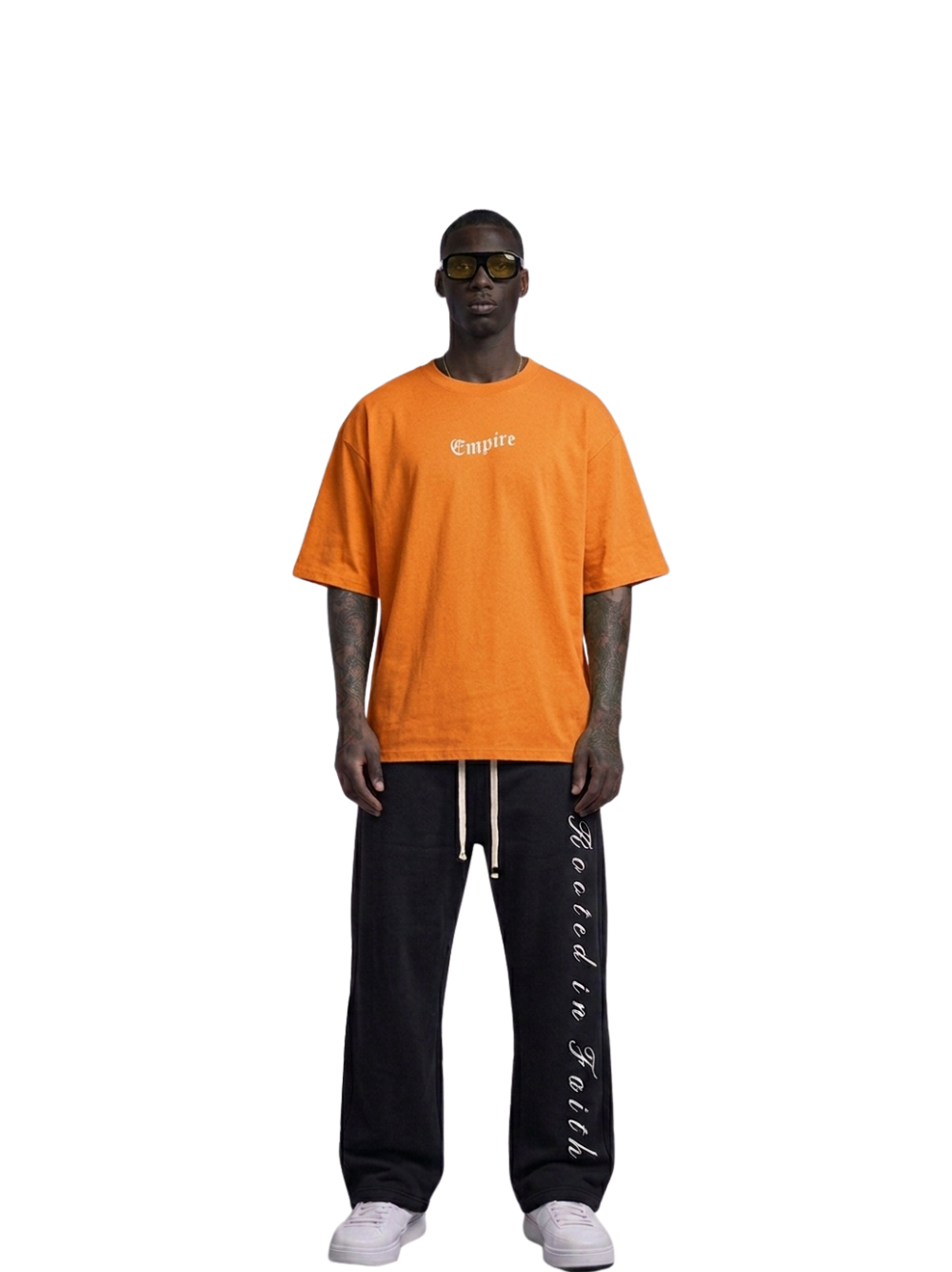 Empire orange oversized graphic t shirt at unseen grail. local brands south africa. streetwear. men and women. studio image male model full image
