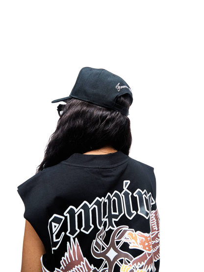 Empire oversized vest black at unseen grail. local brands south africa. streetwear. men and women. studio image female model back view 1