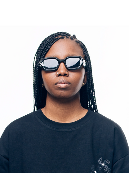 Empire sunglasses black at unseen grail. local brands south africa. streetwear. men and women. studio image female model 