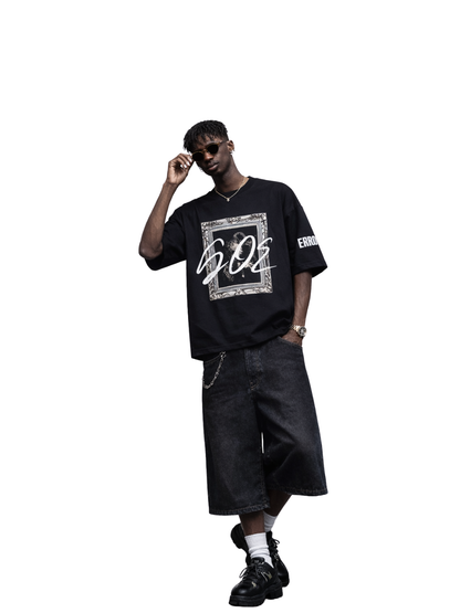 Gallery of errors black oversized graphic t shirt at unseen grail. local brands south africa. streetwear. men and women. studio image male model front full outfit
