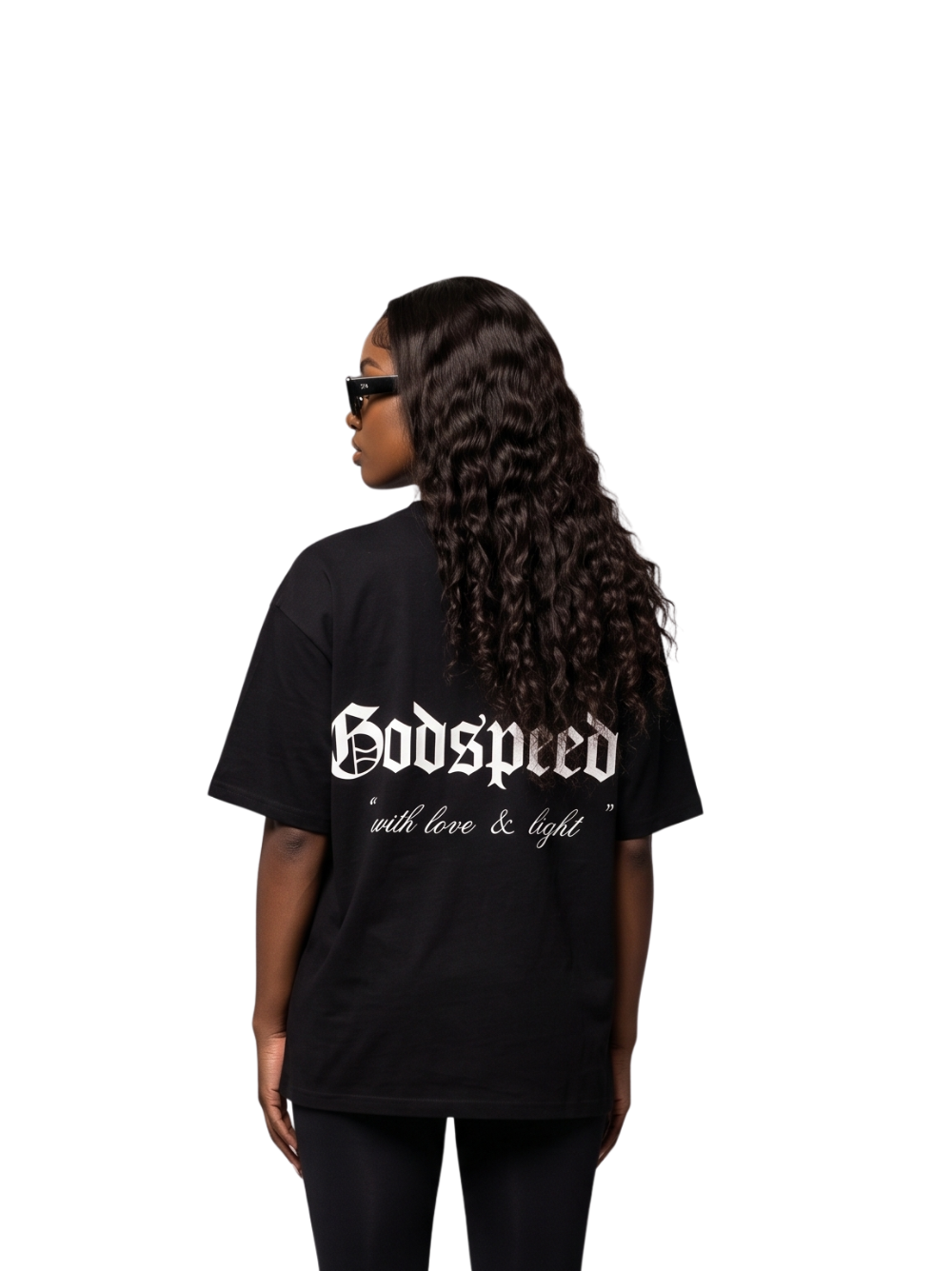 Godspeed black oversized graphic t shirt at unseen grail. local brands south africa. streetwear. men and women. studio image behind female model. galxboy, bantu, boys of soweto