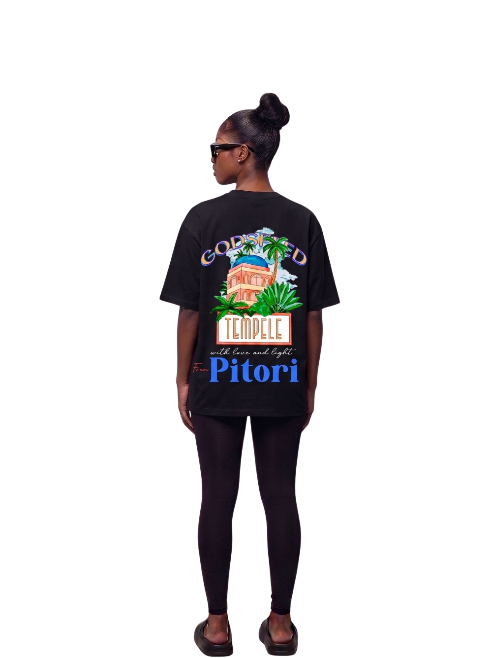 Godspeed black oversized graphic t shirt at unseen grail. local brands south africa. streetwear. men and women. studio image behind female model full outfit. galxboy, bantu, el patron, drip