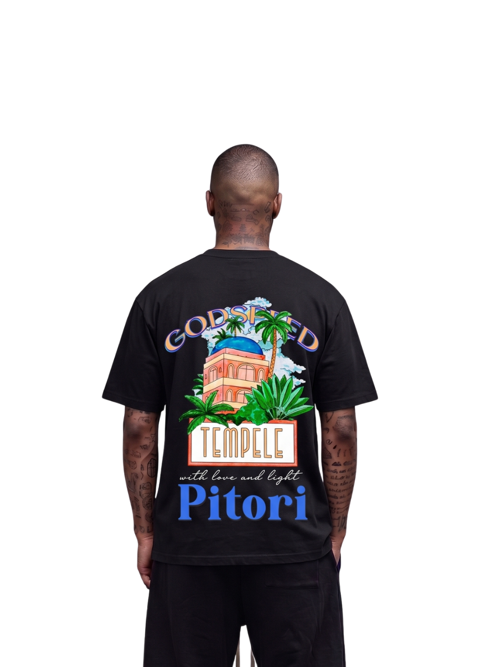 Godspeed black oversized graphic t shirt at unseen grail. local brands south africa. streetwear. men and women. studio image behind male model. galxboy, bantu, el patron, drip