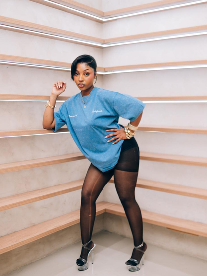 Godspeed blue oversized graphic t shirt at unseen grail. local brands south africa. streetwear. men and women. studio image female model front. galxboy, bantu