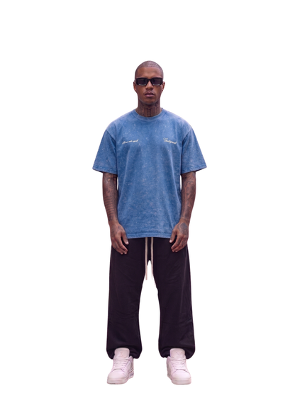 Godspeed blue oversized graphic t shirt at unseen grail. local brands south africa. streetwear. men and women. studio image male model front full outfit. galxboy, bantu