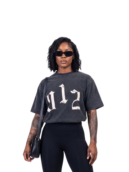 Godspeed grey oversized graphic t shirt at unseen grail. local brands south africa. streetwear. men and women. studio image front female model. galxboy, bantu, represent